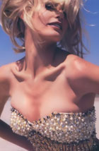 Daryl Hannah performs a dance topless.