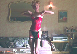 Juliette Lewis dancing and participating in an erotic scene.